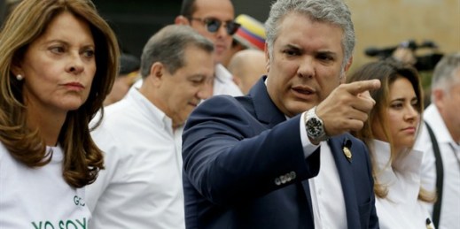 Colombian President Ivan Duque and Vice President Marta Lucia Ramirez, left, take part in a march to repudiate terrorism in Bogota, Colombia, Jan. 20, 2019 (AP photo by Fernando Vergara).