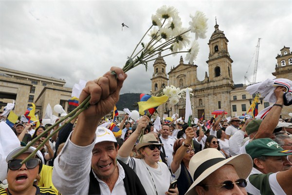 Demonstrators participate in a rally against terrorism in Bolivar Square, Bogota, Colombia, Jan. 20, 2019 (AP photo by Fernando Vergara).