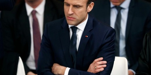 French President Emmanuel Macron listens to a question during a meeting with mayors and local association members as part of the “national debate,” in Evry-Courcouronnes, south of Paris, Feb. 4, 2019 (AP photo by Thibault Camus).