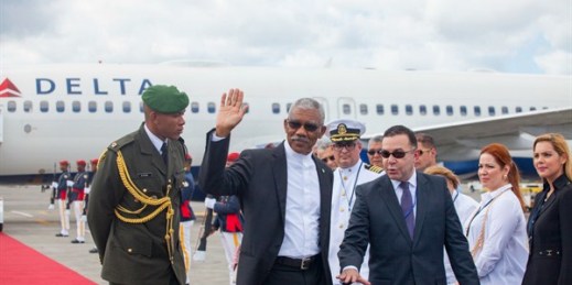 Guyana’s president, David Granger, second left, arrives at Punta Cana International Airport in the Dominican Republic, Jan. 24, 2017 (AP photo by Tatiana Fernandez).