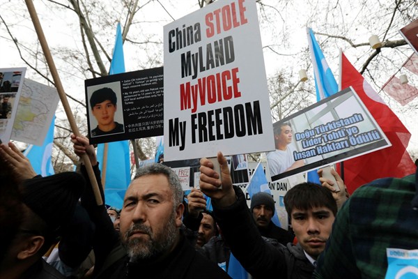 Uighurs living in Turkey protest against China’s oppression of Muslim Uighurs in far-western Xinjiang province, in Ankara, Turkey, Feb. 5, 2018 (AP photo by Burhan Ozbilici).