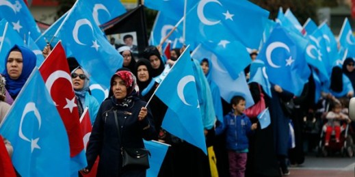 People from the Uighur community in Turkey carry flags of what ethnic Uighurs call ‘East Turkestan,’ during a protest in Istanbul, Nov. 6, 2018 (AP photo by Lefteris Pitarakis).