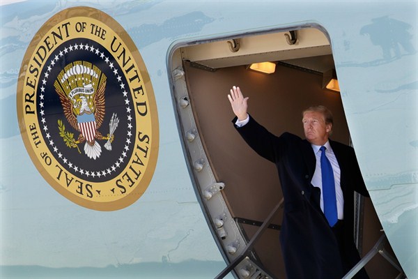 President Donald Trump boards Air Force One for a trip to Vietnam to meet with North Korean leader Kim Jong Un, at Andrews Air Force Base, Maryland, Feb. 25, 2019 (AP Photo by Evan Vucci).