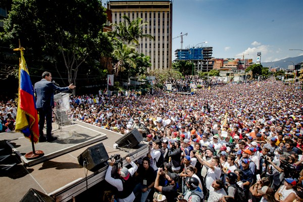 Venezuelan opposition leader Juan Guaido addresses supporters at a rally in Caracas, Venezuela, Feb. 3, 2019 (Sputnik photo by Leo Alvarez via AP Images).