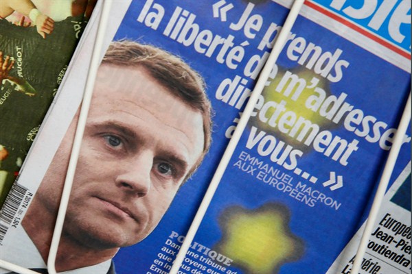 A newspaper featuring an open letter from French President Emmanuel Macron on a newsstand in Paris, March 5, 2019 (AP photo by Francois Mori).