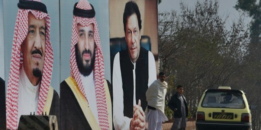 Portraits of Saudi King Salman, Crown Prince Mohammed bin Salman and Pakistani Prime Minister Imran Khan line a highway outside Islamabad ahead of the crown prince's visit to tout Saudi investment in Pakistan, Feb. 17, 2019 (AP photo by Anjum Naveed).