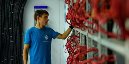 A cryptocurrency mining center in the Leningrad region of Russia, Aug. 20, 2018 (Photo by Alexei Danichev for Sputnik via AP).