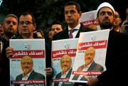 Activists protesting the killing of Saudi journalist Jamal Khashoggi hold a candlelight vigil outside the Saudi Consulate in Istanbul, Oct. 25, 2018 (AP photo by Lefteris Pitarakis).