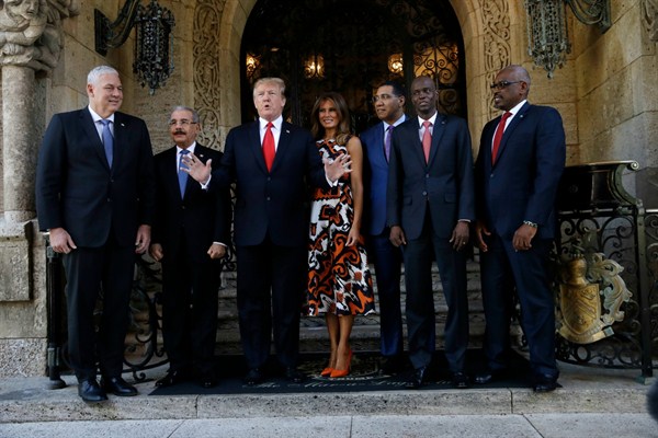 President Donald Trump and first lady Melania Trump meet with Caribbean leaders at Mar-a-Lago in Palm Beach, Fla., March 22, 2019 (AP photo by Carolyn Kaster).