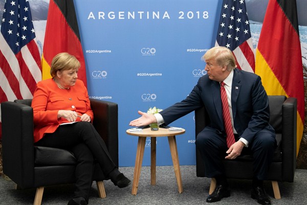 German Chancellor Angela Merkel and U.S. President Donald Trump at the G-20 summit in Buenos Aires, Argentina, Dec. 1, 2018 (Photo by Ralf Hirschberger for dpa via AP Images).