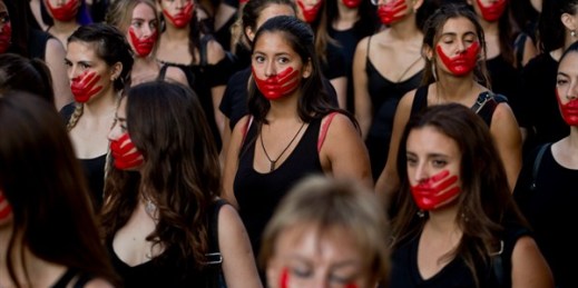 Women take part in an International Women’s Day march in Santiago, Chile, March 8, 2019 (AP photo by Esteban Felix).