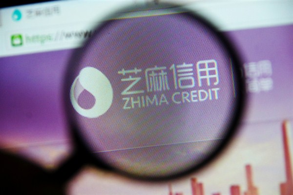 The logo of the Zhima Credit service of Alibaba’s Ant Financial on a smartphone in Jinan, China, May 28, 2018 (Photo by Da Qing for Imaginechina via AP Images).