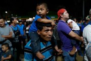 Honduran migrants en route to Mexico gather in a park in Tecun Uman, Guatemala, Jan. 17, 2019 (AP photo by Moises Castillo).