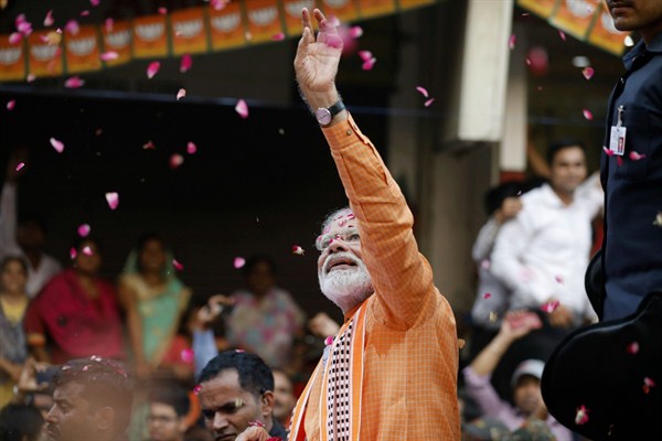 Indian Prime Minister Narendra Modi greets the crowd during a visit to Varanasi, India, April 25, 2019 (AP photo by Rajesh Kumar Singh).