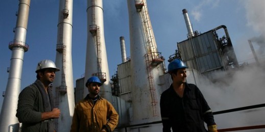 Iranian oil workers at an oil refinery south of Tehran, Iran, Dec. 22, 2014 (AP photo by Vahid Salemi).