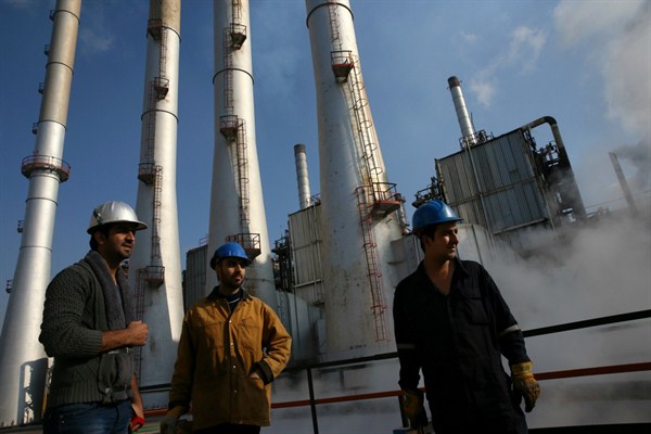 Iranian oil workers at an oil refinery south of Tehran, Iran, Dec. 22, 2014 (AP photo by Vahid Salemi).