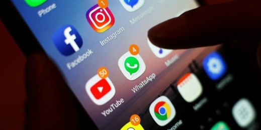 Social media apps displayed on a smartphone, March 1, 2018 (Press Association photo via AP Images).