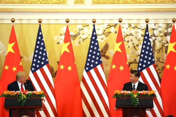 U.S. President Donald Trump and Chinese President Xi Jinping, right, during a joint press conference at the Great Hall of the People, Beijing, Nov. 9, 2017 (AP photo by Andrew Harnik).