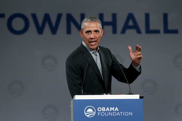 Former U.S. President Barack Obama gestures as he speaks during a town hall meeting at the European School For Management And Technology, Berlin, Germany, April 6, 2019 (AP photo by Michael Sohn).