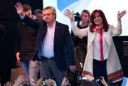 Presidential candidate Alberto Fernandez, left, and his running mate, former President Cristina Fernandez de Kirchner, greet supporters during their kick-off campaign rally, Buenos Aires, Argentina, May 25, 2019 (AP photo by Gustavo Garello).