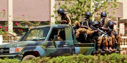 Troops ride in a vehicle near central Ouagadougou, Burkina Faso, March 2, 2018 (AP photo by Ludivine Laniepce).
