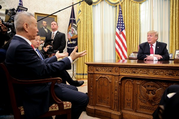 President Donald Trump and Chinese Vice Premier Liu He in the Oval Office of the White House, Washington, Jan. 31, 2019 (Photo by Oliver Contreras for dpa via AP Images).