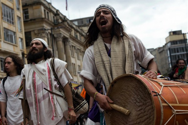 Members of the Muisca indigenous community take part in a demonstration against Colombian President Ivan Duque’s government’s National Development Plan, in Bogota, Colombia, April 25, 2019 (Photo by Yulieth Rincon for dpa via AP Images).