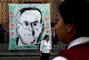 A banner depicting slain Guatemalan Bishop Juan Jose Gerardi at a rally to mark the 12th anniversary of his murder in Guatemala City, April 26, 2010 (AP photo by Moises Castillo).