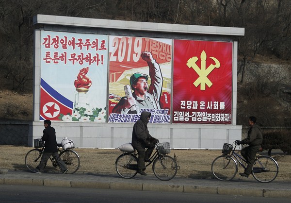 North Korean men ride their bicycles in Pyongyang, North Korea, Feb. 1, 2019 (AP photo by Dita Alangkara).