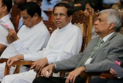 Sri Lankan President Maithripala Sirisena, center, and Prime Minister Ranil Wickremesinghe, right, attend a ceremony to destroy a haul of seized cocaine, in Katunayaka, Sri Lanka, Jan. 15, 2018 (AP photo by Eranga Jayawardena).