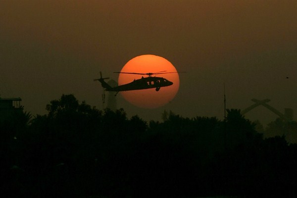 A U.S. Army Black Hawk helicopter flies over Baghdad, Iraq, Oct. 30, 2007 (AP photo by Marko Drobnjakovic).