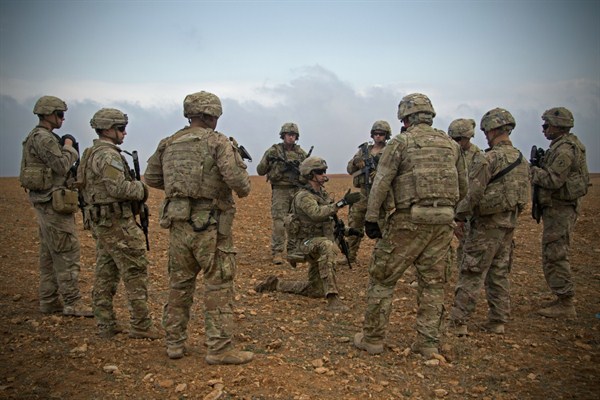 U.S. soldiers gather for a brief during a combined joint patrol rehearsal in Manbij, Syria, Nov. 7, 2018 (Photo by Spc. Zoe Garbarino for U.S. Army via AP Images).