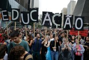 Demonstrators protest against a massive cut in the education budget imposed by the administration of Brazilian President Jair Bolsonaro, in Sao Paulo, Brazil, May 15, 2019 (AP photo by Andre Penner).
