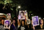 Demonstrators hold photos of persons who were killed during Brazil’s dictatorship during a protest in Sao Paulo, Brazil, March 31, 2019 (AP photo by Andre Penner).