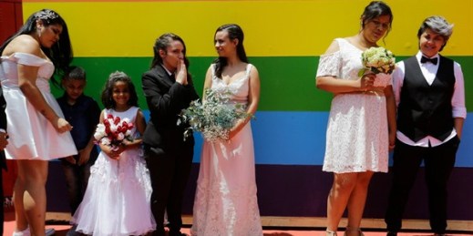 Same-sex couples wait to get married prior to a group marriage in Sao Paulo, Brazil, Dec. 15, 2018 (AP photo by Nelson Antoine).