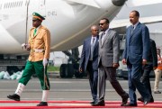 Eritrean President Isaias Afwerki, right, is welcomed by Ethiopian Prime Minister Abiy Ahmed at the airport in Addis Ababa, Ethiopia, July 14, 2018 (AP photo by Mulugeta Ayene).