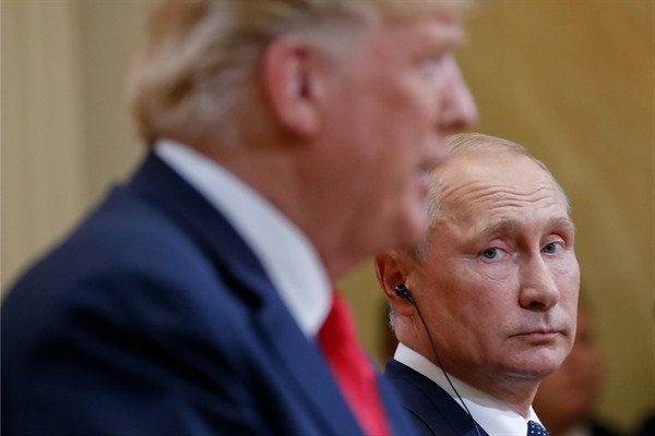Russian President Vladimir Putin and U.S. President Donald Trump at a joint news conference at the Presidential Palace in Helsinki, Finland, Aug. 18, 2018 (AP photo by Pablo Martinez Monsivais).