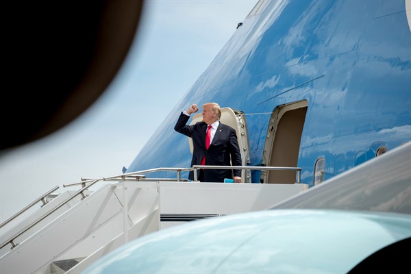 President Donald Trump boards Air Force One at Peterson Air Force Base, Colo., May 30, 2019 (AP photo by Andrew Harnik).