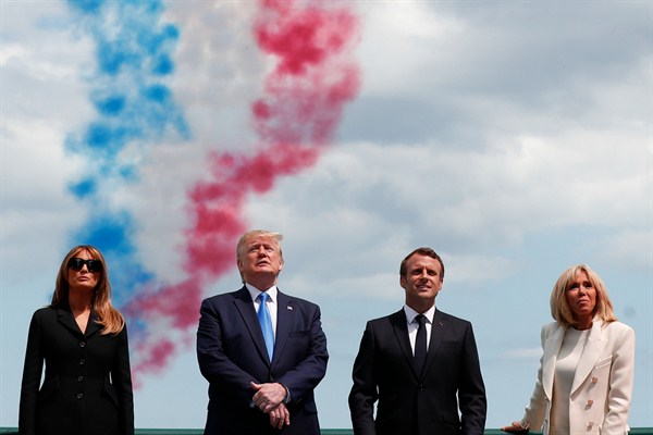 U.S. President Donald Trump, First Lady Melania Trump, French President Emmanuel Macron and his wife, Brigitte Macron, attend a ceremony to mark the 75th anniversary of D-Day, Normandy, France, June 6, 2019 (pool photo by Ian Langsdon via AP Images).