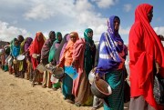 Women who fled drought line up to receive food distributed at a camp for displaced persons in the Daynile neighborhood on the outskirts of Mogadishu, Somalia, May 18, 2019 (AP photo by Farah Abdi Warsameh).