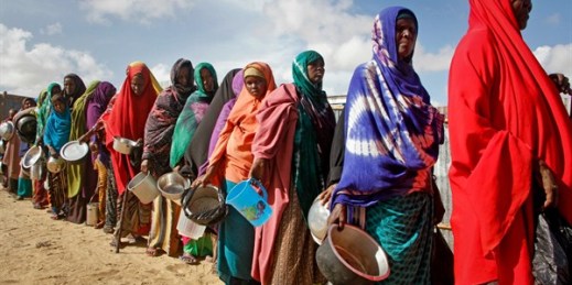 Women who fled drought line up to receive food distributed at a camp for displaced persons in the Daynile neighborhood on the outskirts of Mogadishu, Somalia, May 18, 2019 (AP photo by Farah Abdi Warsameh).