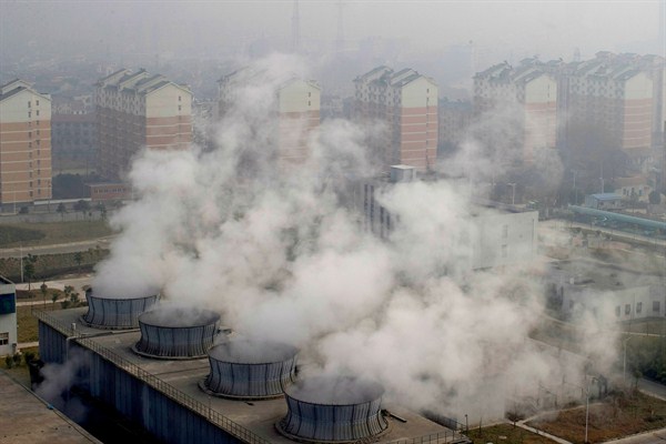 Smoke rises from a garbage incineration plant in Wuhan, China, Jan. 9, 2015 (Photo by Dong Mu for Imaginechina via AP Images).