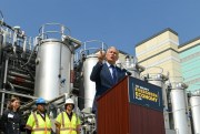 Jay Inslee, the governor of Washington and a Democratic presidential candidate, unveiling part of his climate change policy at the Blue Plains Advanced Wastewater Treatment Plant, Washington, May 16, 2019 (AP photo by Susan Walsh).