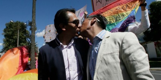 A couple kisses outside the Constitutional Court as they wait to hear the final decision on same-sex marriage, in Quito, Ecuador, June 4, 2019 (AP photo by Dolores Ochoa).