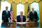 U.S. President Donald Trump, with Treasury Secretary Steven Mnuchin and Vice President Mike Pence, after signing an executive order to increase sanctions on Iran, at the White House, Washington, June 24, 2019 (AP photo by Alex Brandon).