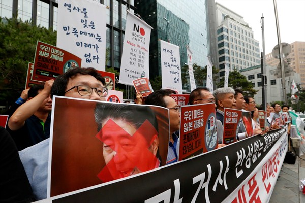 South Korean small and medium-sized business owners stage a rally calling for a boycott of Japanese products in front of the Japanese embassy in Seoul, South Korea, July 15, 2019 (AP photo by Ahn Young-joon).