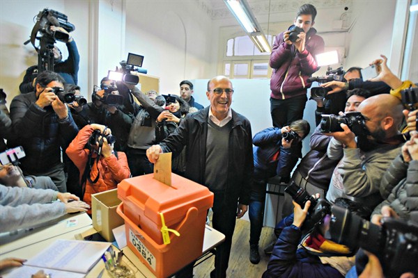 Presidential hopeful Daniel Martinez of the leftist Broad Front casts his vote during primary elections, Montevideo, Uruguay, June 30, 2019 (AP photo by Matilde Campodonico).