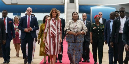 First lady Melania Trump walks with Ghana’s first lady, Rebecca Akufo-Addo, as she arrives at Kotoka International Airport in Accra, Ghana, Oct. 2, 2018 (AP photo by Carolyn Kaster).