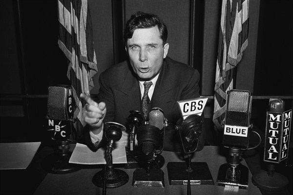 Wendelll Willkie, who girdled the globe in a tour to observe firsthand the conduct of the war in the Allied nations, rehearses his report to the nation at a radio station, in New York City, Oct. 26, 1942 (AP photo by Murray Becker).