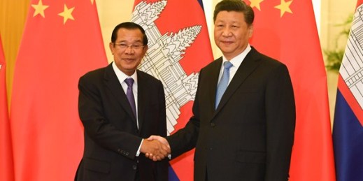 Cambodian Prime Minister Hun Sen, left, shakes hands with Chinese President Xi Jinping before their meeting at the Great Hall of the People, in Beijing, April 29, 2019 (pool photo by Madoka Ikegami of Kyodo via AP Images).